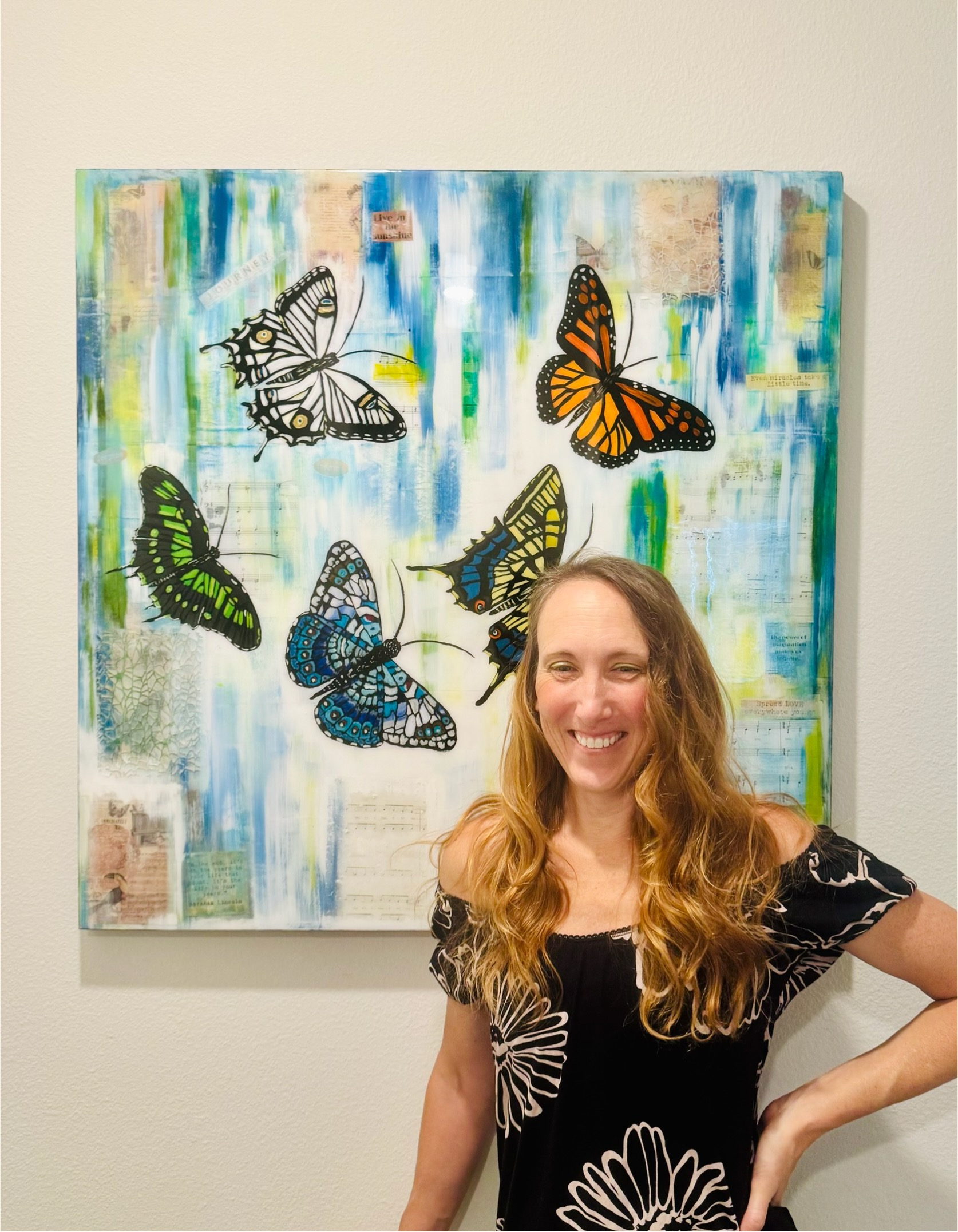 Picture of Kasey with butterfly painting